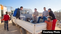 Filmmakers Chris Temple and Zach Ingrasci at Za'atari refugee camp in Jordan. (Credit: Living on One/1001 Media)