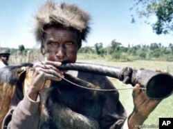 An Ogiek man in traditional dress