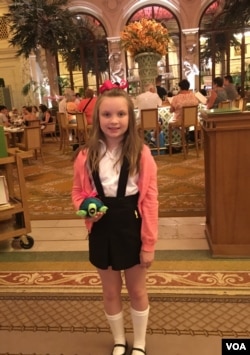 Eloise fan, Annie Clark, poses in the lobby of the Plaza Hotel.