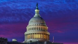 In shades of red and blue, dawn arrives on Capitol Hill in Washington, Friday, Nov. 6, 2020. (AP Photo/J. Scott Applewhite)