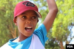 Kelly Lemaiyen calls baseball "a very wonderful game" and says it helps instill discipline in him. (L. Ruvaga/VOA)