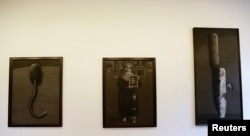 Artworks by Syrian artist Youssef Abdelke are displayed at a gallery in Beirut, Lebanon, Jan. 6, 2014. (Click to enlarge)