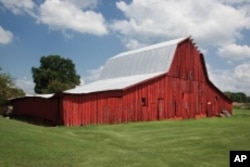 Carol M. Highsmith is photographing wooden barns, which are disappearing across America.