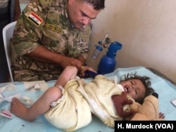 Doctors say children and the elderly are most injured by lack of good food and water in the chaos of the war in Iraq, but they are also most likely to be injured in the violence. As families flee, IS militants fire at them and people that run the slowest are the most likely to be hit in Mosul, Iraq, June 21, 2017.