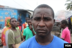 Robert Sayon, who lives in West Point, says many live in fear of contracting ebola which impacts an already stressful life in one of Monrovia's poorest districts, Monrovia, Liberia, Sept. 25, 2014. (Benno Muchler /VOA)
