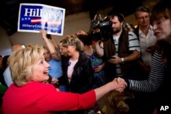 Democratic presidential candidate Hillary Clinton greets patrons at Lone Oak Little Castle Restaurant in Paducah, Kentucky, May 16, 2016.