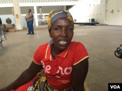 Farmer Laina Magombedzi says she can spend up to a week at the auction floors waiting to be served, and then spend more time queueing for cash at the bank due to over a year-old national cash shortages. She says Zimbabwe’s auctions are giving them "a raw deal" as buyers re-sell the tobacco on the black market for more money, in Harare March 15, 2017. (S. Mhofu/VOA)