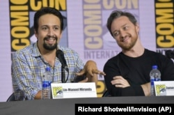 Lin-Manuel Miranda, left, and James McAvoy participate in the "His Dark Materials" panel on day one of Comic-Con International on Thursday, July 18, 2019, in San Diego.