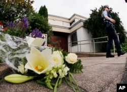 Flowers sit in front of the house of former German Chancellor Helmut Kohl in Oggersheim, Germany, June 16, 2017.