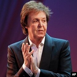 Paul McCartney during 26 Oct concert performance