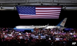 President Donald Trump addresses the crowd during a campaign rally, Nov. 1, 2018, in Columbia, Mo.