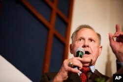FILE - Former Alabama Chief Justice and U.S. Senate candidate Roy Moore speaks to supporters in Montgomery, Alabama, Aug. 15, 2017.