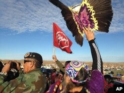 Demonstrators against the Dakota Access oil pipeline hold a ceremony at the main protest camp near Cannon Ball, North Dakota, Nov. 15, 2016.