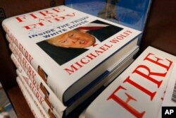 A stack of reserved "Fire and Fury" books by writer Michael Wolff sit on a shelf in a bookstore in Richmond, Virginia, Jan. 5, 2018.