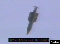 FILE - The GBU-43/B, also known as the Massive Ordnance Air Blast, is launched successfully from a MC-130E Combat Talon I aircraft during a test at Eglain Air Force Base, Florida, Nov. 21, 2003, in this handout photo provided April 13, 2017.