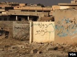 In this village once controlled by Islamic State militants, graffiti mocks IS, roughly calling it "Epic Fail State", in Hassan Sham, Kurdistan, Iraq, Oct. 21, 2016. (Photo: H. Murdock / VOA)