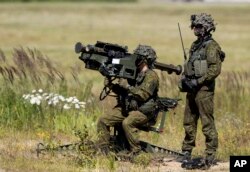 Lithuania's soldiers take part in the NATO multinational ground-based air defense units exercise "Tobruq Legacy 2017" at the Siauliai airbase in Lithuania, July 20, 2017.