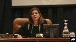 FILE - Hind Kabawat, a member of the Negotiations Committee on Syria is seen at a press conference after a meeting of Syrian opposition groups in Riyadh, Saudi Arabia, Dec, 10, 2015. Kabawat says it is essential that families learn the fate of their loved ones.