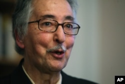 FILE - Former Iranian President Abolhassan Bani-Sadr, pictured in December 2009, says the Iranian project of putting together a "Shi'ite crescent," from Iran to Iraq, Syria and Lebanon, "irritates Gulf countries."