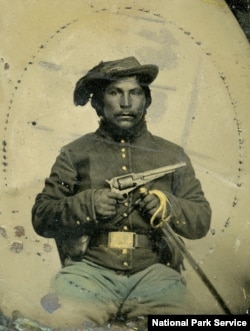 This undated photo shows an unidentified Native American soldier dressed in a Union uniform. Native Americans fought on both sides of the U.S. Civil War.