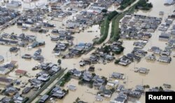 A flooded area is seen after heavy rains in Kurashiki, Okayama Prefecture, Japan, July 8, 2018. (Kyodo/via Reuters)