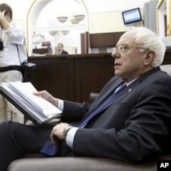 Sen. Bernie Sanders, D-Vt., speaks to reporters on Capitol Hill in Washington, March 10, 2011