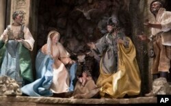 A detail of the baby Jesus is seen in a Nativity Scene in the East Room during a media preview of the 2017 holiday decorations at the White House in Washington, Monday, Nov. 27, 2017.