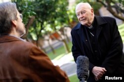 FILE - Cardinal Theodore McCarrick speaks during an interview at the North American College at the Vatican, Feb. 14, 2013. McCarrick recently resigned amid allegations of sexual misconduct.
