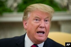 FILE - President Donald Trump speaks during a meeting with Slovak Prime Minister Peter Pellegrini in the Oval Office of the White House, May 3, 2019, in Washington.