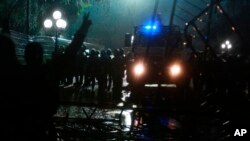 Police block the road near the Parliament building during clashes in Tirana, Albania, May 13, 2019.