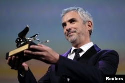 Director Alfonso Cuaron's "Roma" won the Golden Lion for Best Film at the Venice Film Festival in Venice, Italy, Sept. 8, 2018.