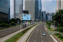 Suasana jalanan di Jakarta tampak sepi pada saat penerapan PPKM Darurat yang diberlakukan 3-20 Juli 2021 (foto: Reuters).