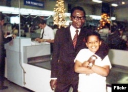 Young Barack Obama with his father