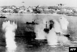 FRANCE -- In this file photo taken on June 06, 1944 Allied ships are attacked by German fighters as the largest massed assault of World War II begins to land men and supplies on the coast of northern France.