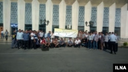 In this undated image published by Iranian news agency ILNA on July 30, 2018, railway workers stage a protest in the northwestern Iranian city of Tabriz to demand resolution of labor complaints including unpaid salaries.