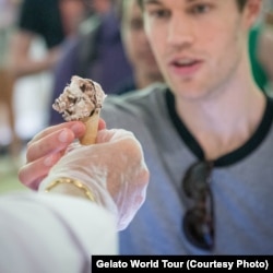 A festival-goer tastes gelato at the Gelato World Tour event in Chicago.