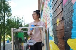Amanda Phingbodhipakkiya, a multidisiciplinary artist and speaker based in Brooklyn, New York, painted a mural in Washington, D.C. on June, 2021.
