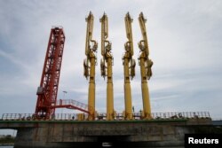 A Chinese port terminal is seen in Made island outside Kyauk Pyu, Rakhine state, Myanmar, May 18, 2017.