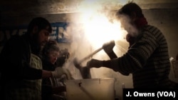 Condition remain grim but have improved from last month, when the weather was freezing and acrid smoke from fires burning treated railway sleepers filled the barracks.