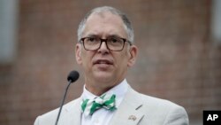 FILE - Jim Obergefell, the named plaintiff in the same-sex marriage case decided by the U.S. Supreme Court speaks during the National LGBT 50th Anniversary Ceremony, July 4, 2015, in front of Independence Hall in Philadelphia.