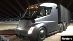 Tesla's new electric semitractor-trailer is unveiled during a presentation in Hawthorn, California, Nov. 16, 2017.