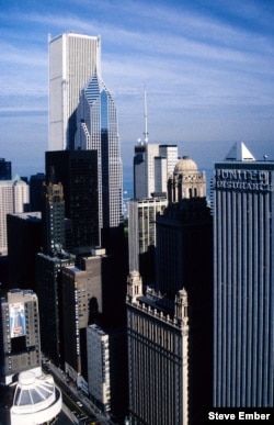 A rooftop view from Marina City toward Lake Michigan. The taller building is the Aon Center; to its right, Two Prudential Plaza. (Photo by Steve Ember)