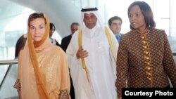 (l-r) United Nations Climate Change Convention, Executive Secretary Christiana Figueres; Convention President Abdullah bin Hamad Al-Attiyah; and former Convention President Maite Nkoana-Mashabane. (IISD Reporting Services)