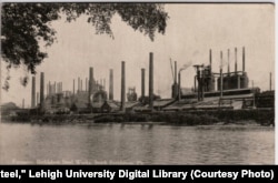 View of the Bethlehem Steel plant across the Lehigh River, South Bethlehem, Pennsylvania, sometime between 1907-1914.