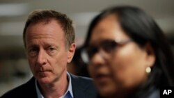 Los Angeles Unified School District Superintendent Austin Beutner, left, and board president Monica Garcia wait in the hallway for a news conference at the LAUSD headquarters, Jan. 15, 2019, in Los Angeles.