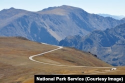 Cars drive along Trail Ridge Road