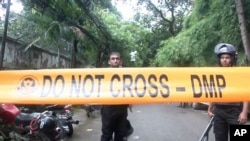 Bangladeshi security forces block a road in Dhaka, July 2, 2016.