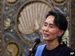 FILE - Myanmar's Foreign Minster Aung San Suu Kyi speaks during a press conference at Foreign Ministry office in Naypyitaw, Myanmar, July 6, 2017.