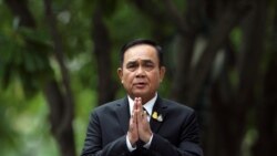 Thailand's Prime Minister Prayuth Chan-ocha gestures while speaking to media members at the Government House in Bangkok, Thailand June 6, 2019.