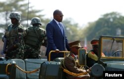 FILE - Burundi's President Pierre Nkurunziza arrives for the celebrations to mark Burundi's 55th anniversary of independence at the Prince Louis Rwagasore stadium in Bujumbura, Burundi, July 1, 2017.